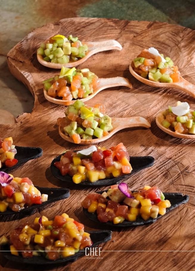 Tartare spoons on a wooden board